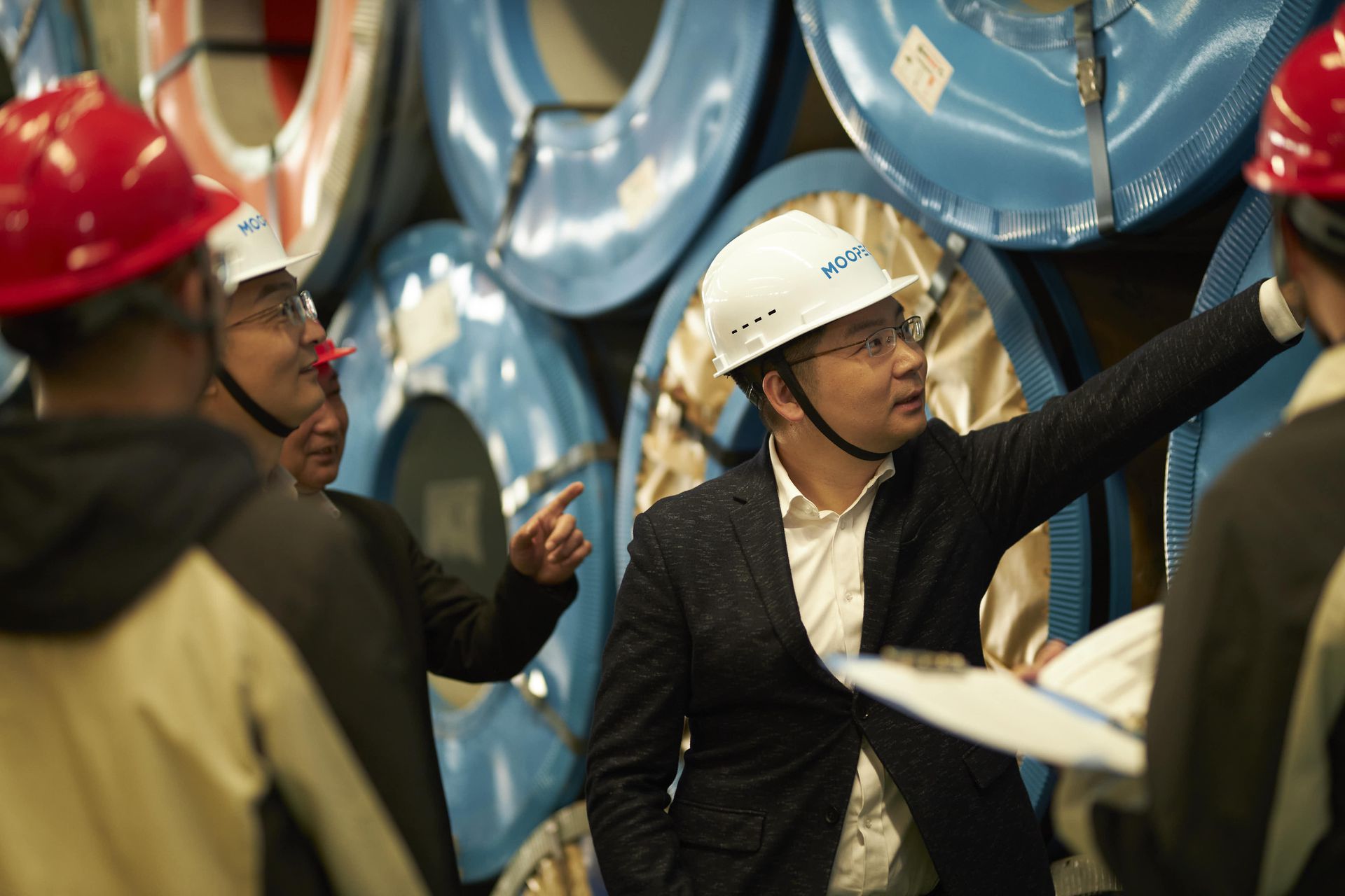 MOOPEC staff with steel coils