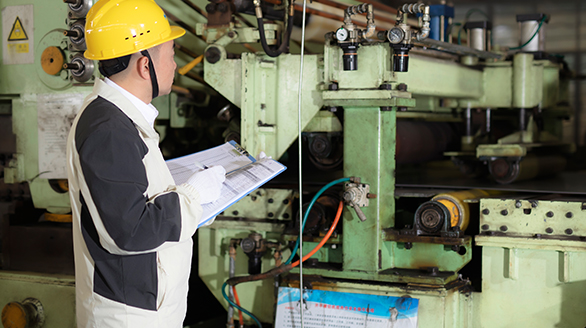 Quality inspector at processing machine