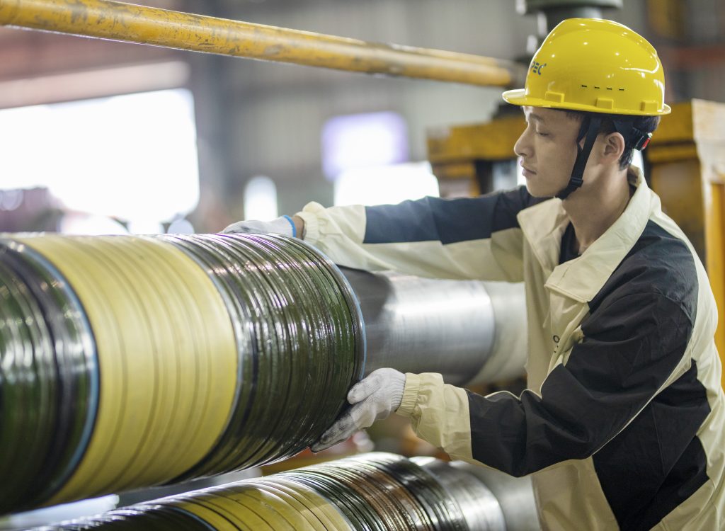 Worker handling slit coil